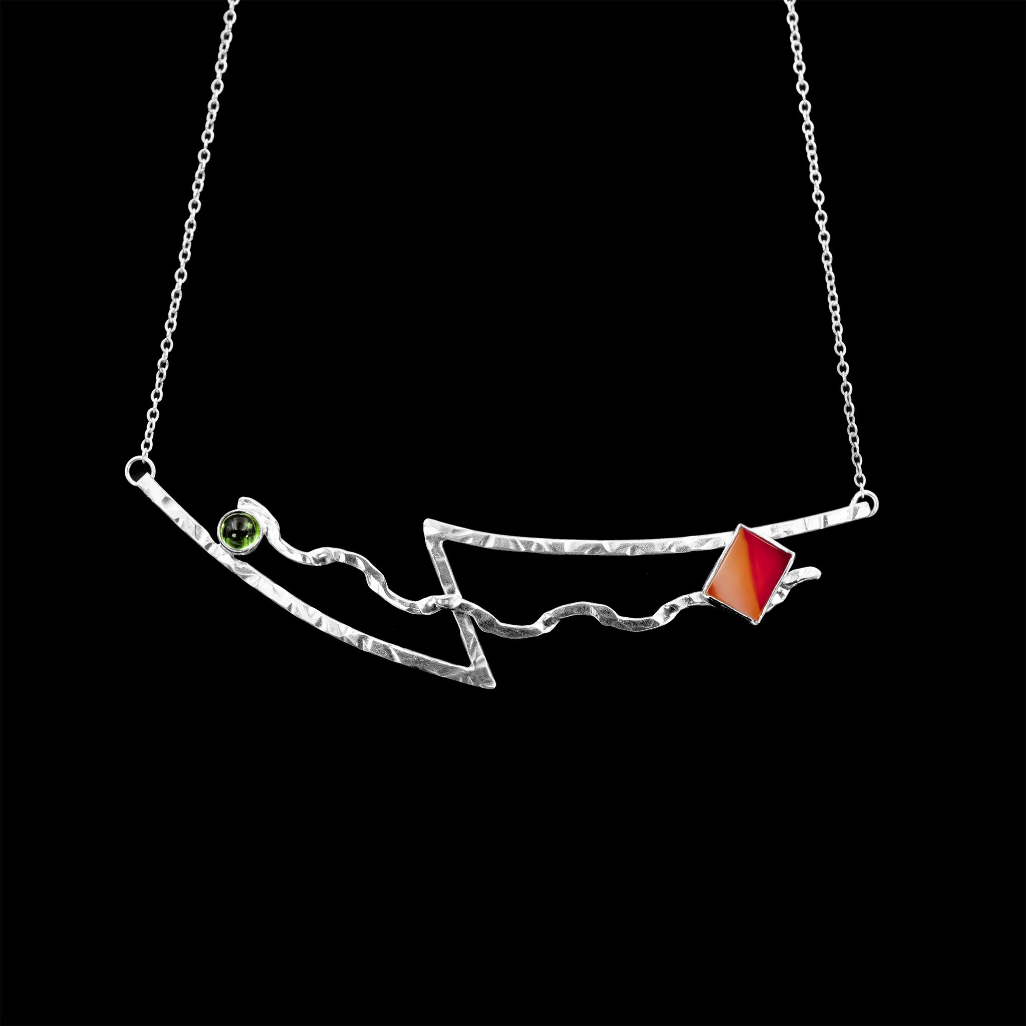 Mischief necklace with red banded agate and green peridot accent by Rouaida.