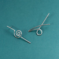 Scribbles earrings by Rouaida.