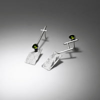Discordant earrings by Rouaida.