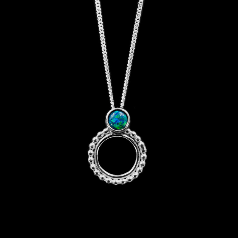 Silver Chronos necklace with green opal stone.