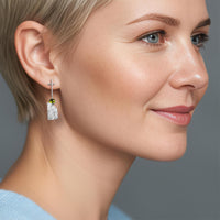 Discordant earrings by Rouaida.