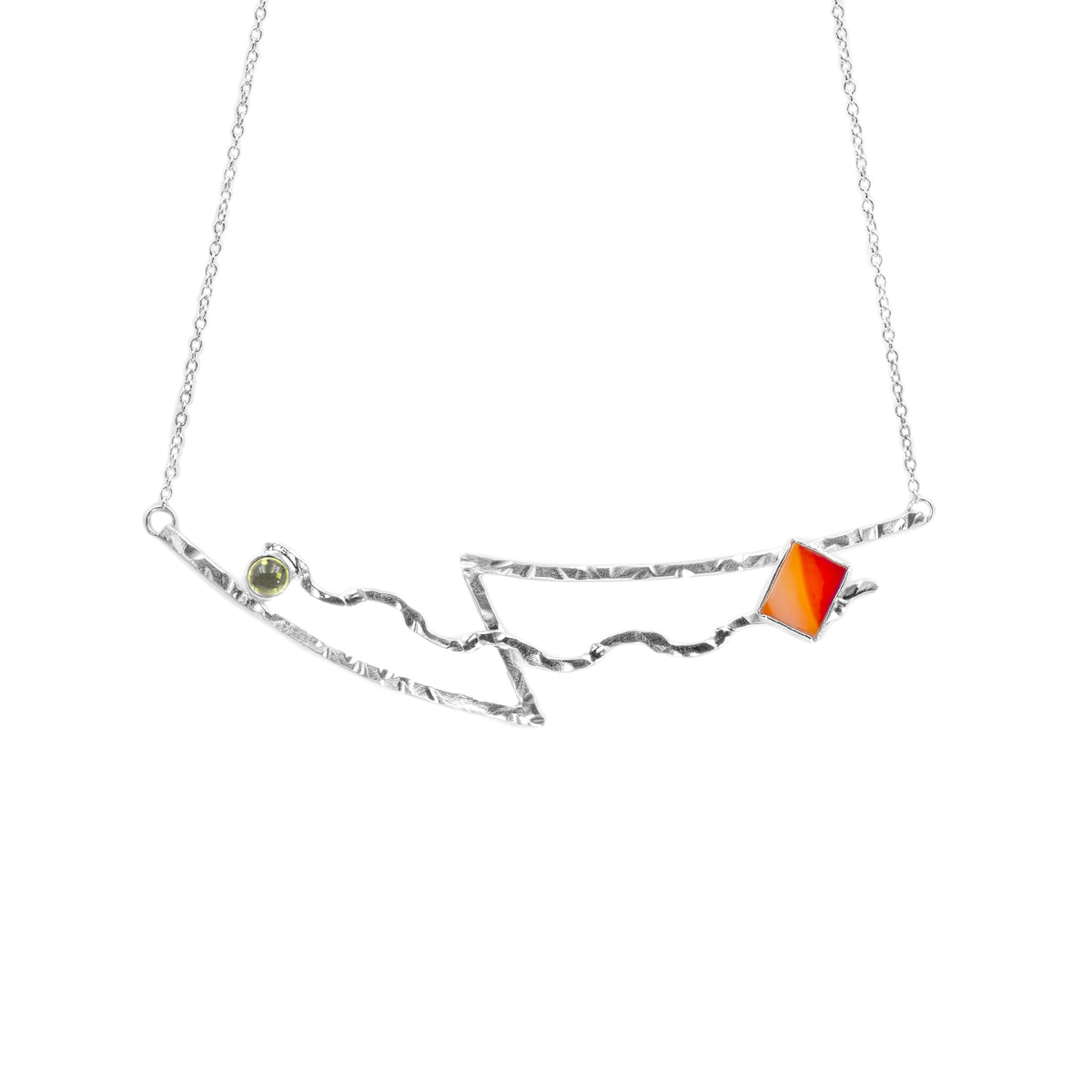 Mischief necklace with round peridot accent by Rouaida.
