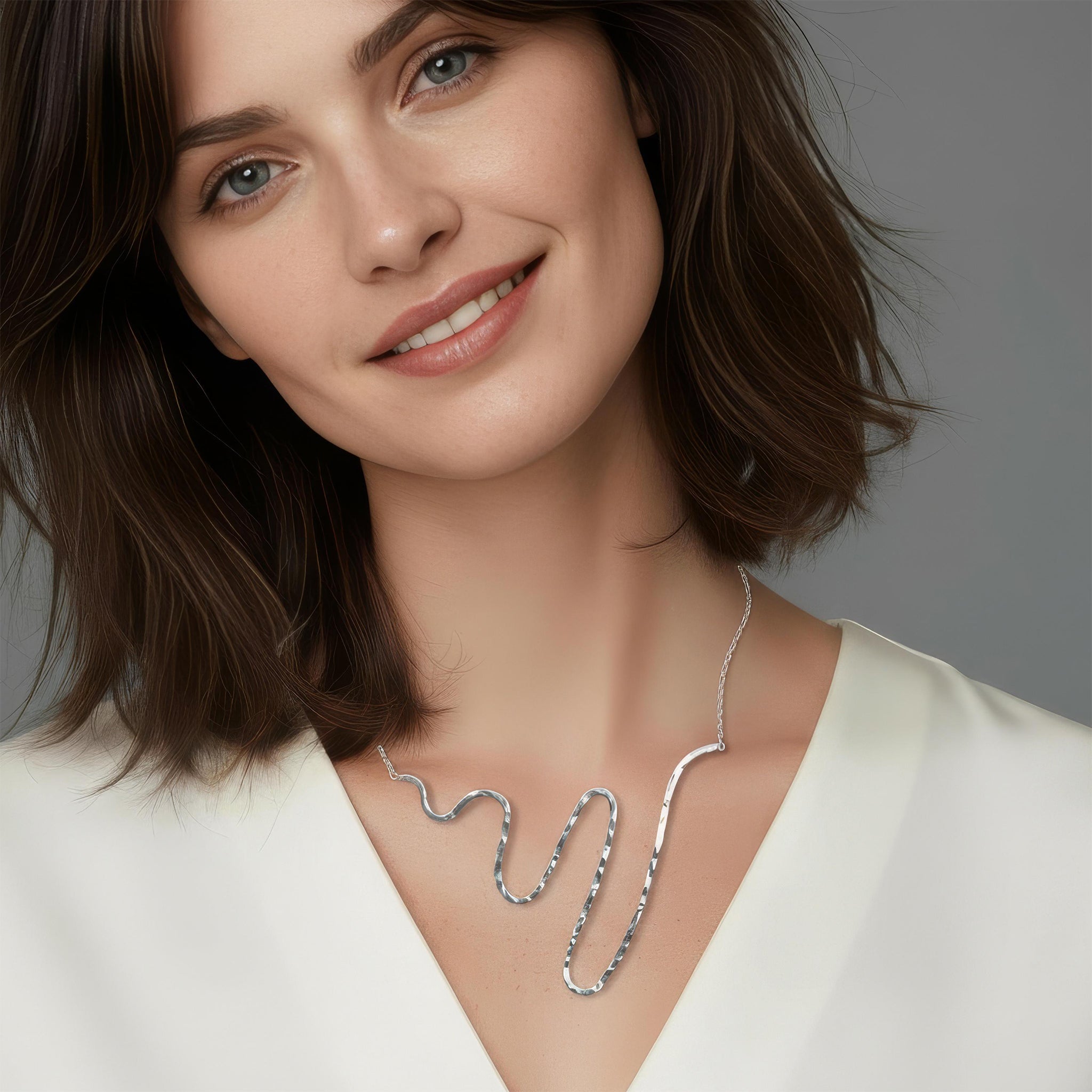 An illustration of how our Storm Surge necklace looks when worn.