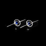 Abyss earrings by Rouaida on black background.