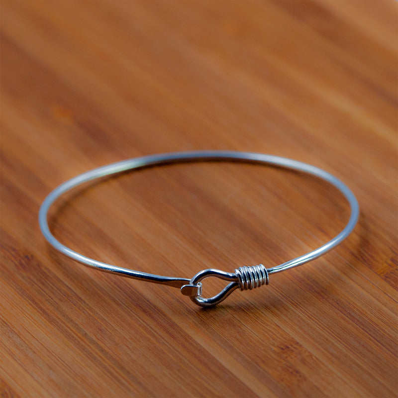 Sterling silver Alpha bangle by Rouaida.