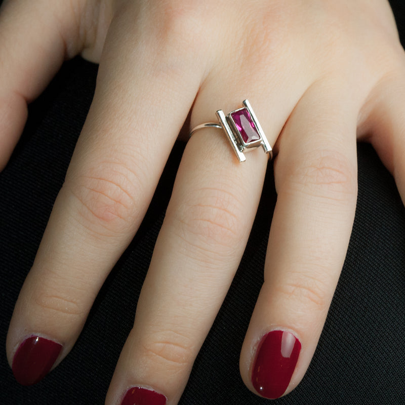 Sterling silver Artemis ring with ruby by Rouaida on woman's hand.