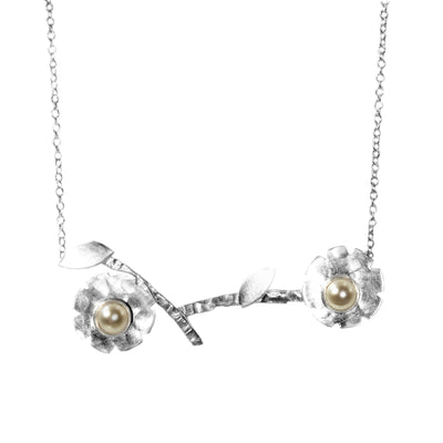 Silver Awakenings necklace by Rouaida with pearls.