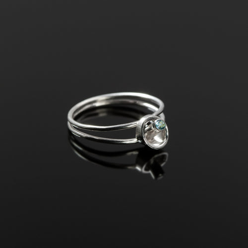 Coaxial ring in sterling silver with aquamarine stone by Rouaida.