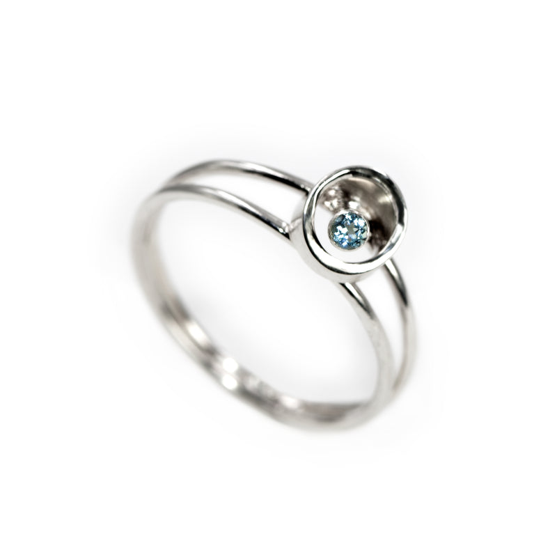 Coaxial ring in sterling silver with aquamarine stone by Rouaida.