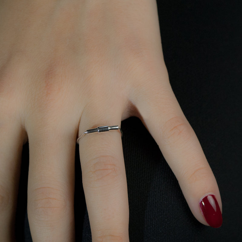 Sterling silver Concentric ring by Rouaida on model's hand.