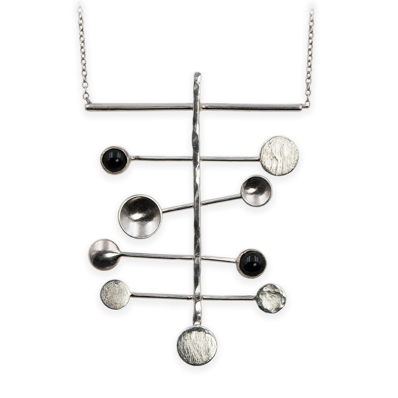 Constellation necklace in sterling silver with hematite accents by Rouaida.