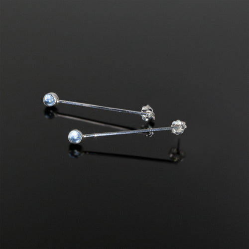 Drop in the Ocean earrings with aquamarine stones by Rouaida.
