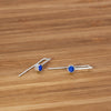 Sterling silver Echo earrings with lapis lazuli stones by Rouaida.