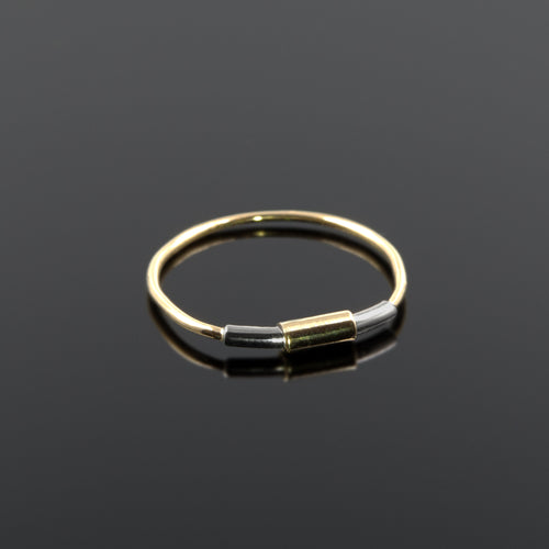 Concentric ring in sterling silver and 18ct gold by Rouaida.