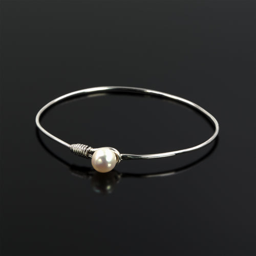 Sterling silver Grace bangle with freshwater pearl by Rouaida.