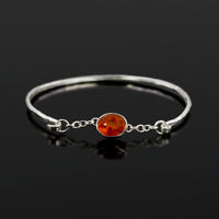 Sterling silver Melody bangle with amber stone by Rouaida.