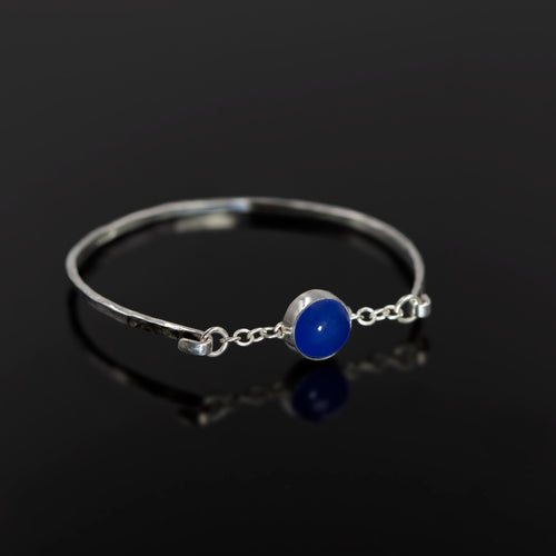 Sterling silver Melody bangle with blue agate stone by Rouaida.