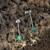 Microcosm earrings by Rouaida. 