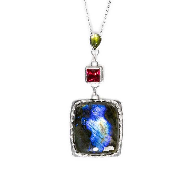 Silver Monarch necklace by Rouaida with ruby, peridot and labradorite stones.