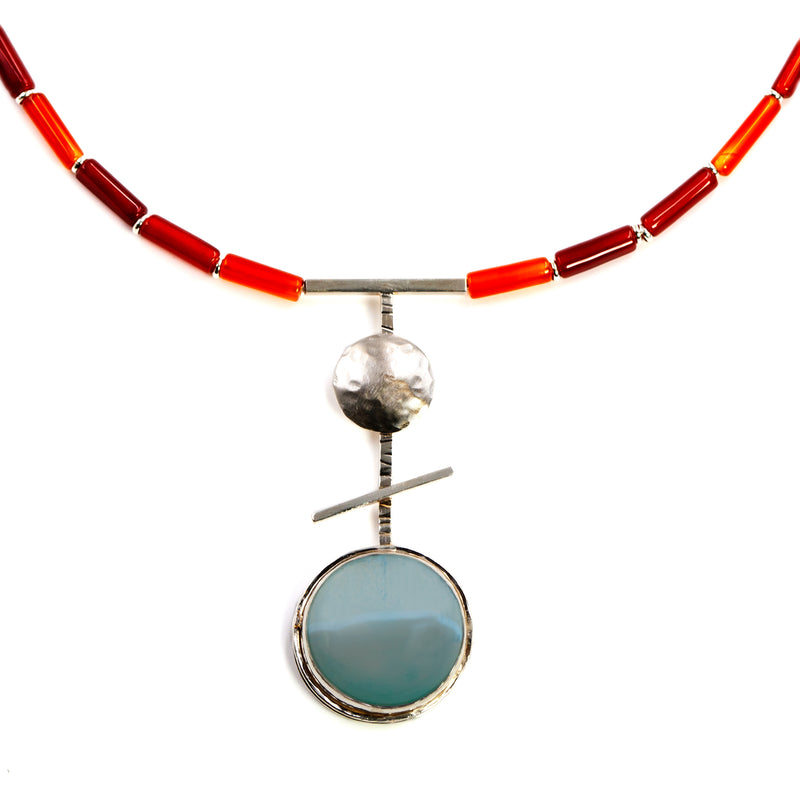 Orb necklace with veined light blue agate by Rouaida.