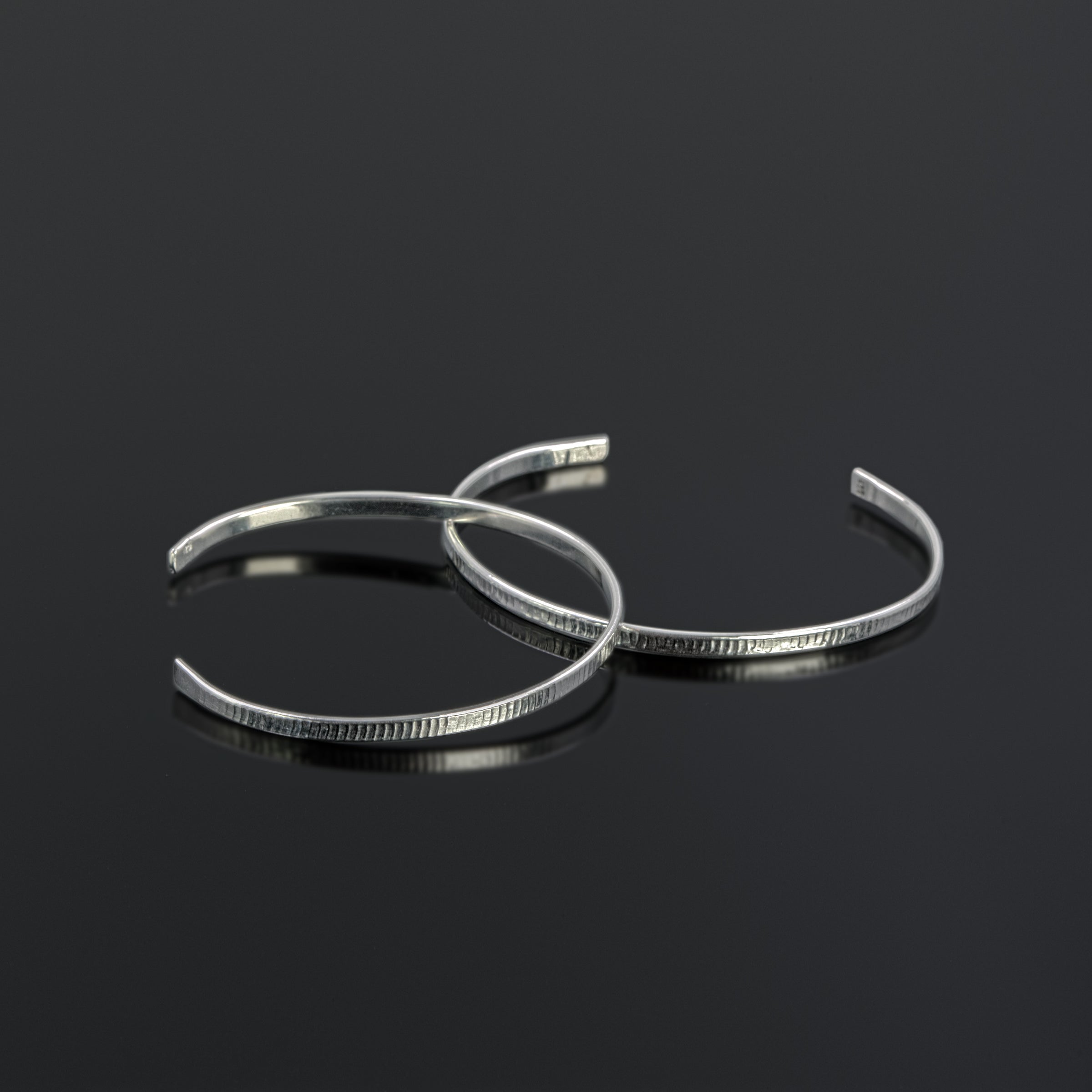 Staccato cuff bracelets in Argentium by Rouaida.