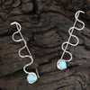 Sterling silver Ripple earrings with opal stones by Rouaida.